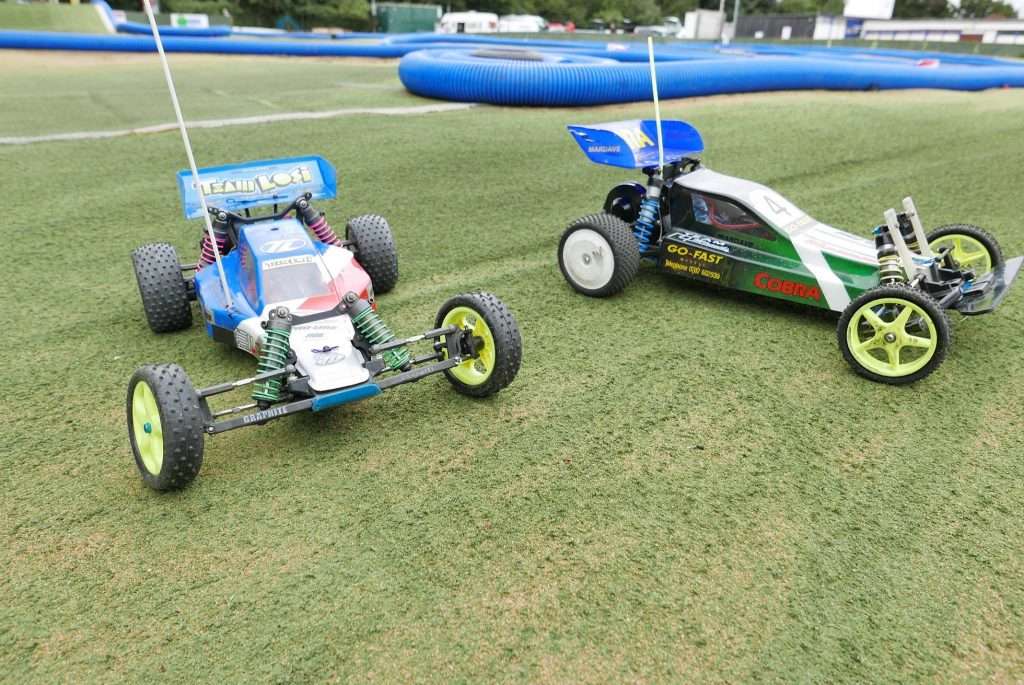 photo of vintage rc buggies on astroturf track